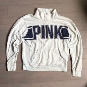 A light blue three quarter zip up.